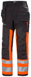 Helly Hansen Alna 2.0 Broeken 77422 Constructie Reflecterend HiVis bouwbroek klasse 1 oranje-ebbenhoutzwart(269)